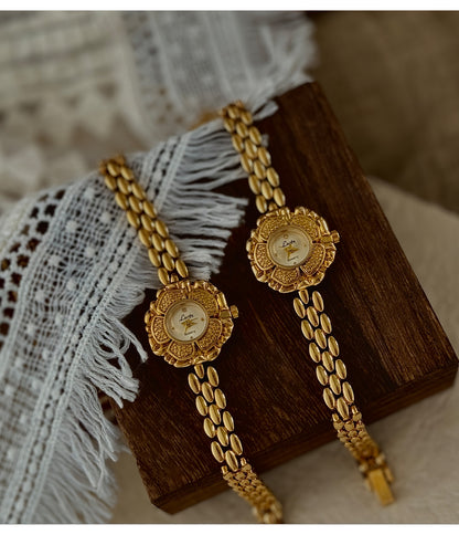 Elegant French-Inspired Golden Camellia Women's Quartz Watch - Boho Chic, Rhinestone Accents, Japanese Movement, Alloy Band - NEXTRENDBAHRAIN